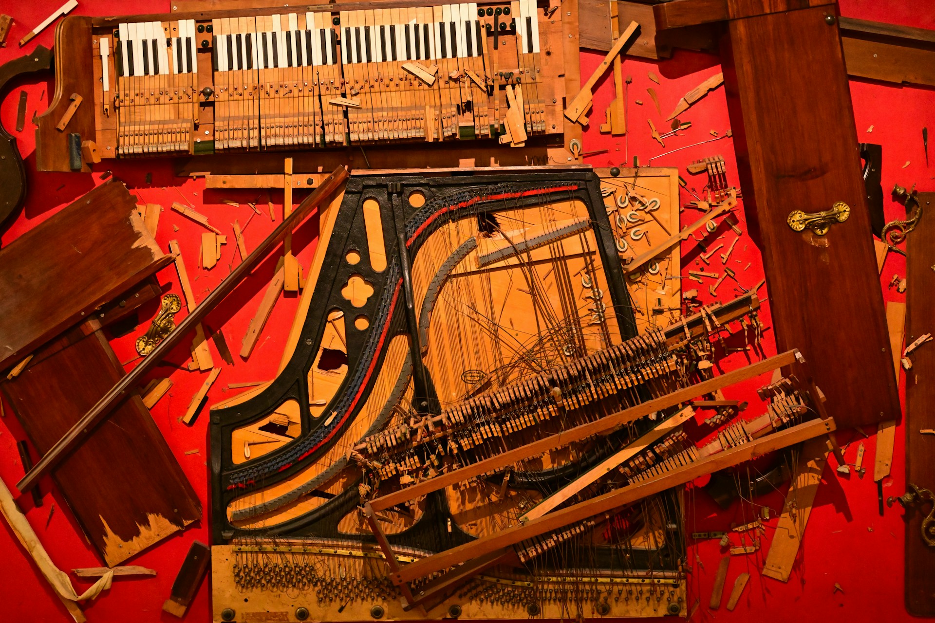 A collection of musical instruments and instruments on a red background