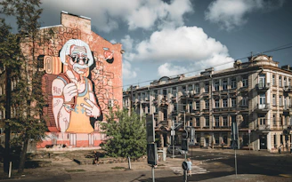 A large building with a mural on the side of it