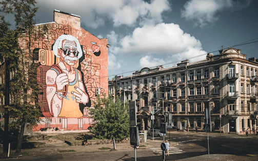 A large building with a mural on the side of it