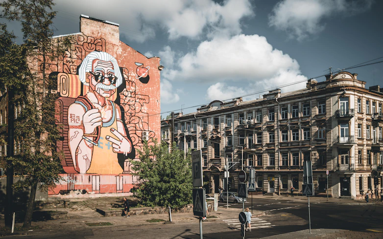 A large building with a mural on the side of it