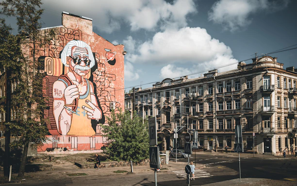 A large building with a mural on the side of it