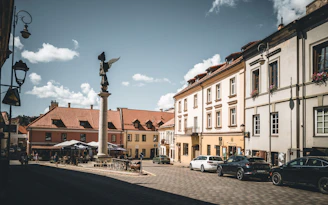 A city street with cars parked on the side of it