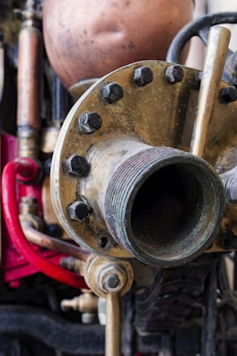 A close up of a machine with pipes and valves
