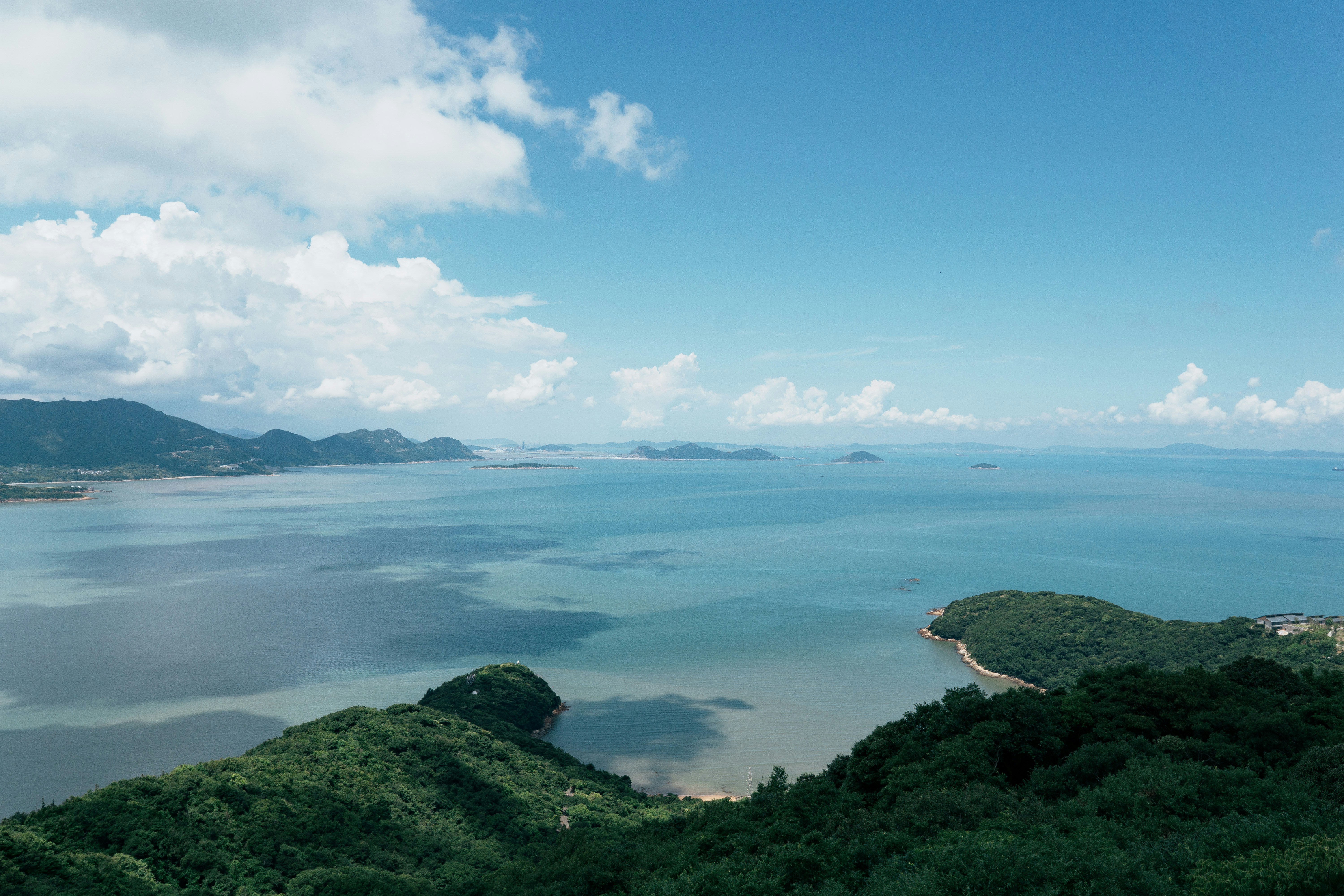 A view of the ocean from a hill