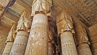The columns of the temple are decorated with egyptian art