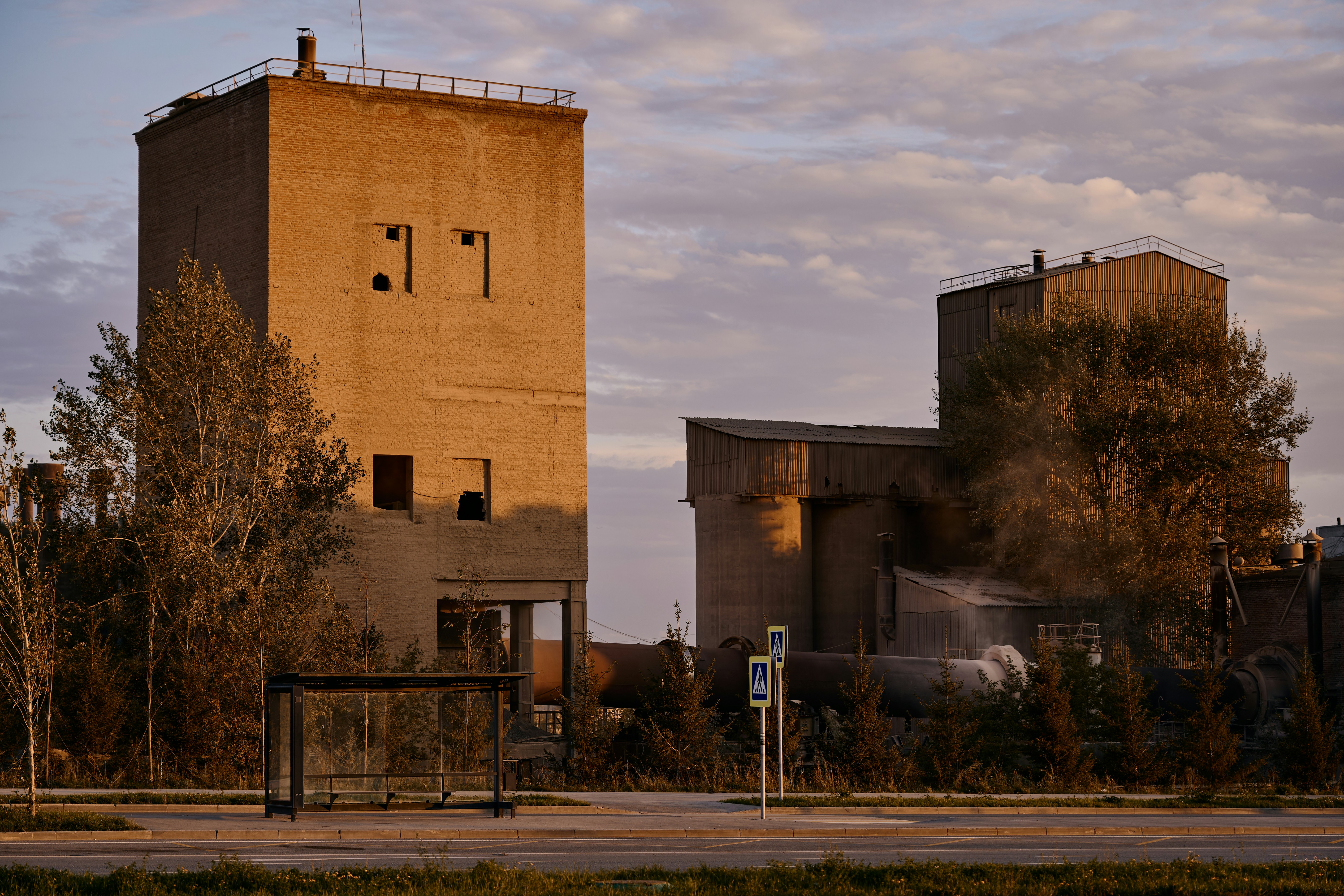 A large building with a fence in front of it