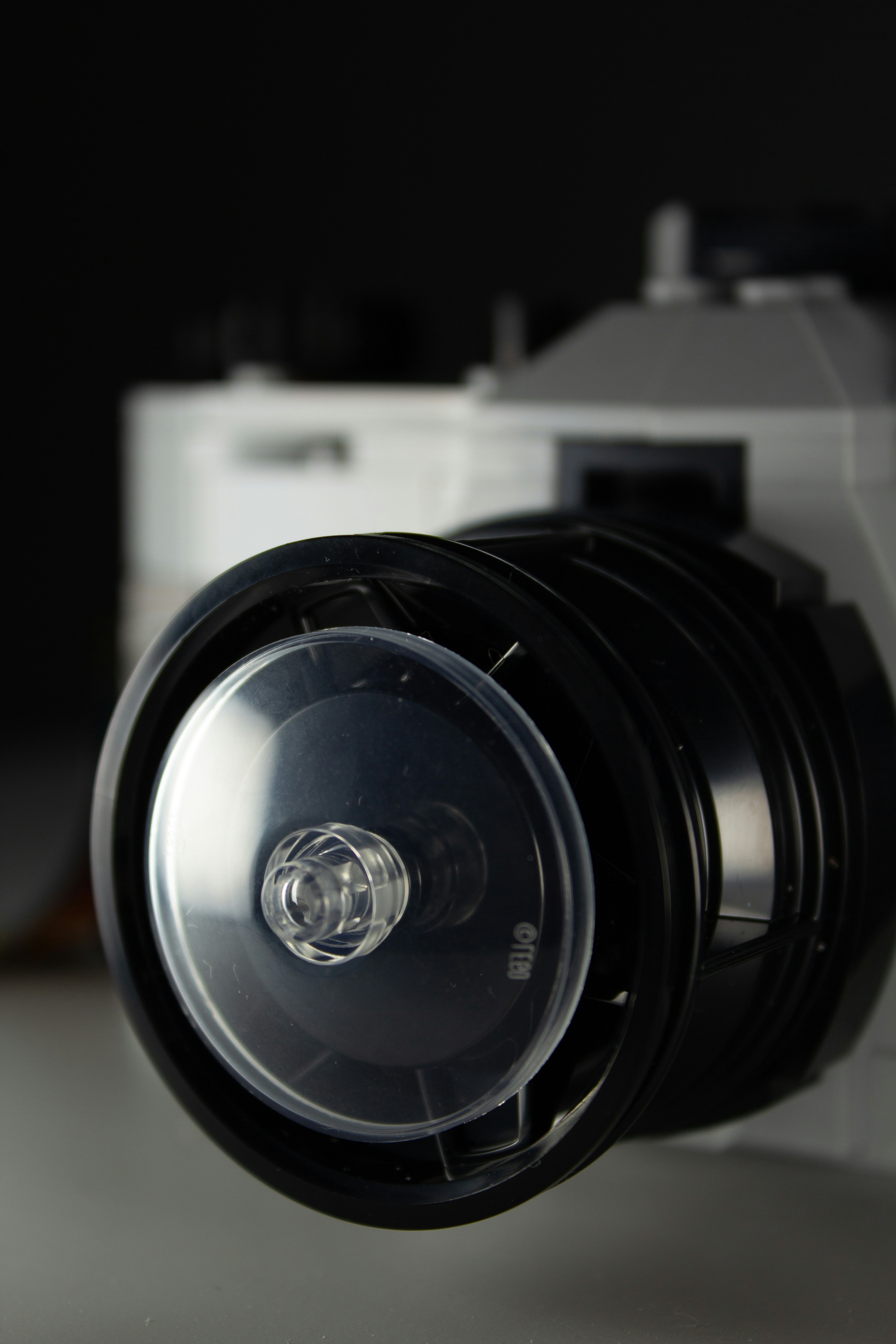 A close up of a camera with a lens
