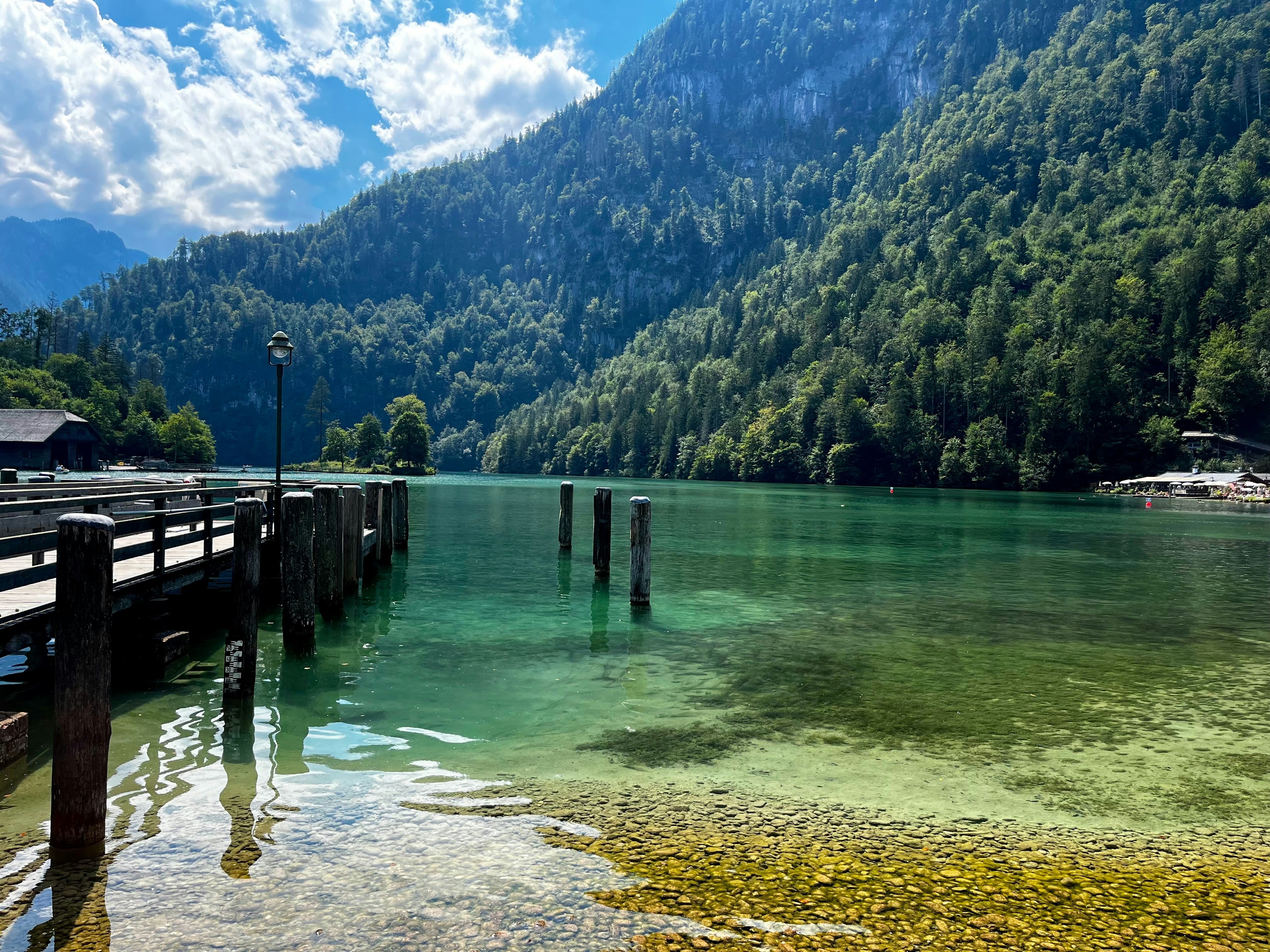 A body of water surrounded by a mountain range