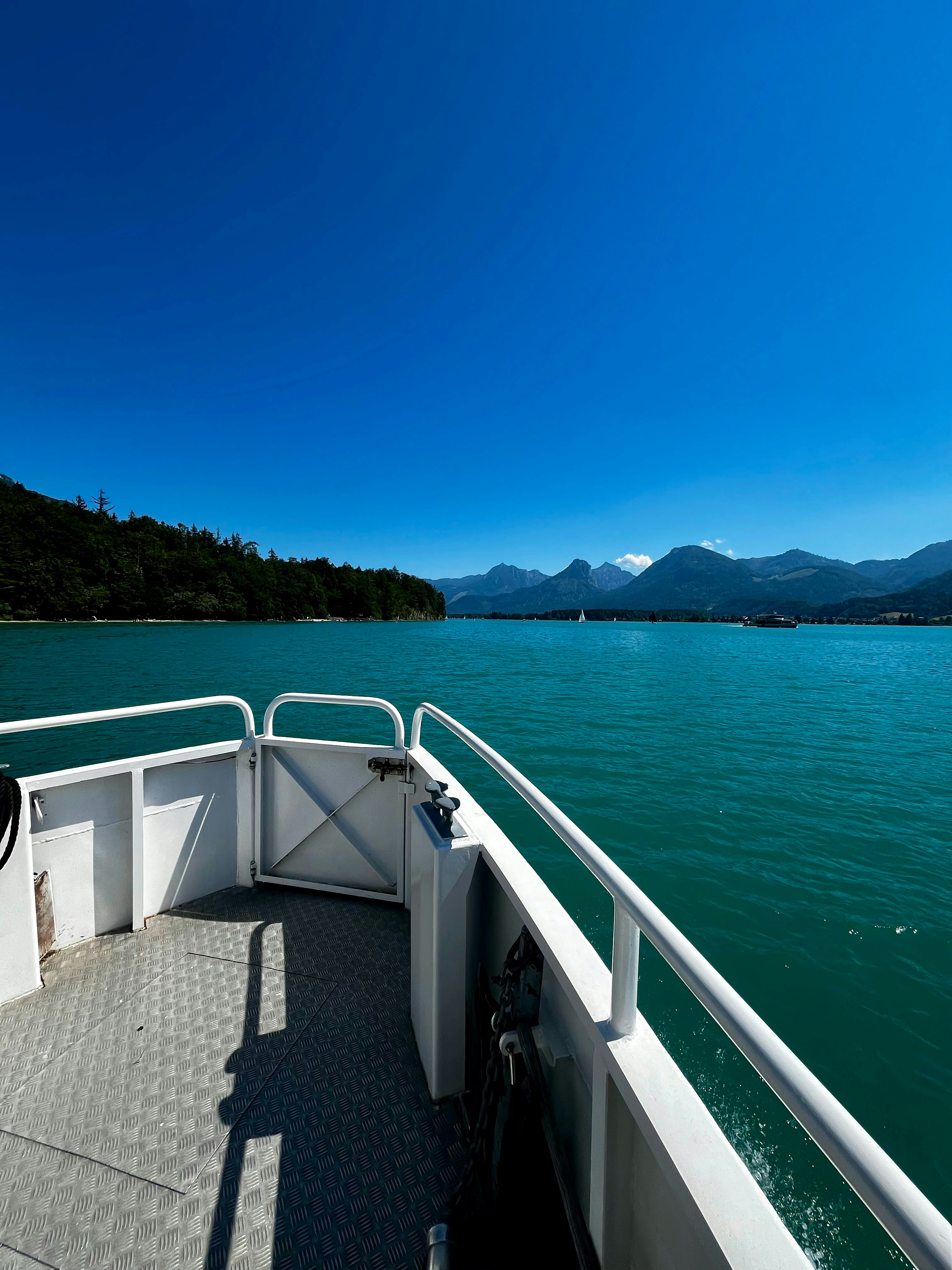 A boat traveling on a large body of water
