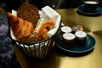 A basket of food sitting on top of a table