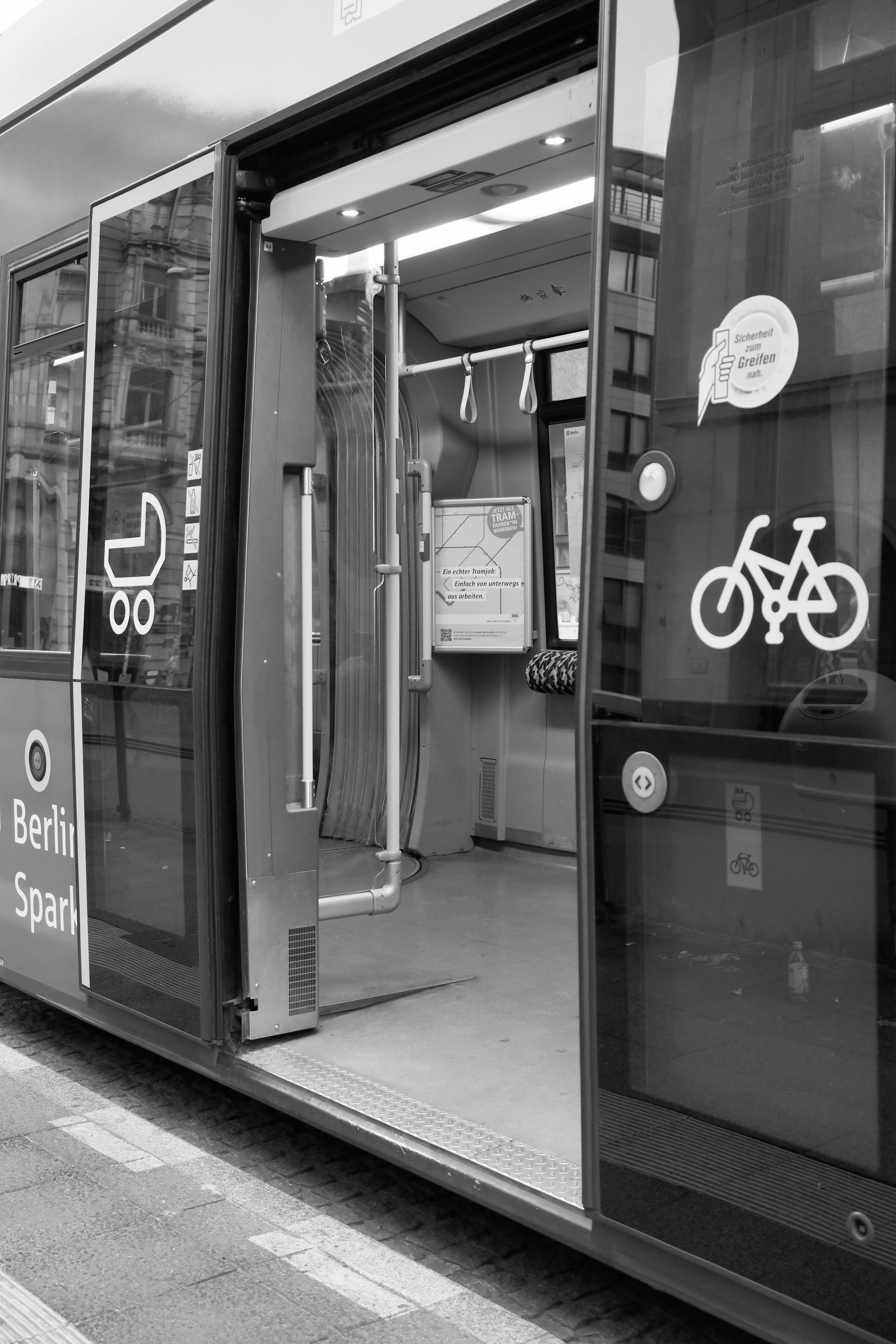 A black and white photo of a train