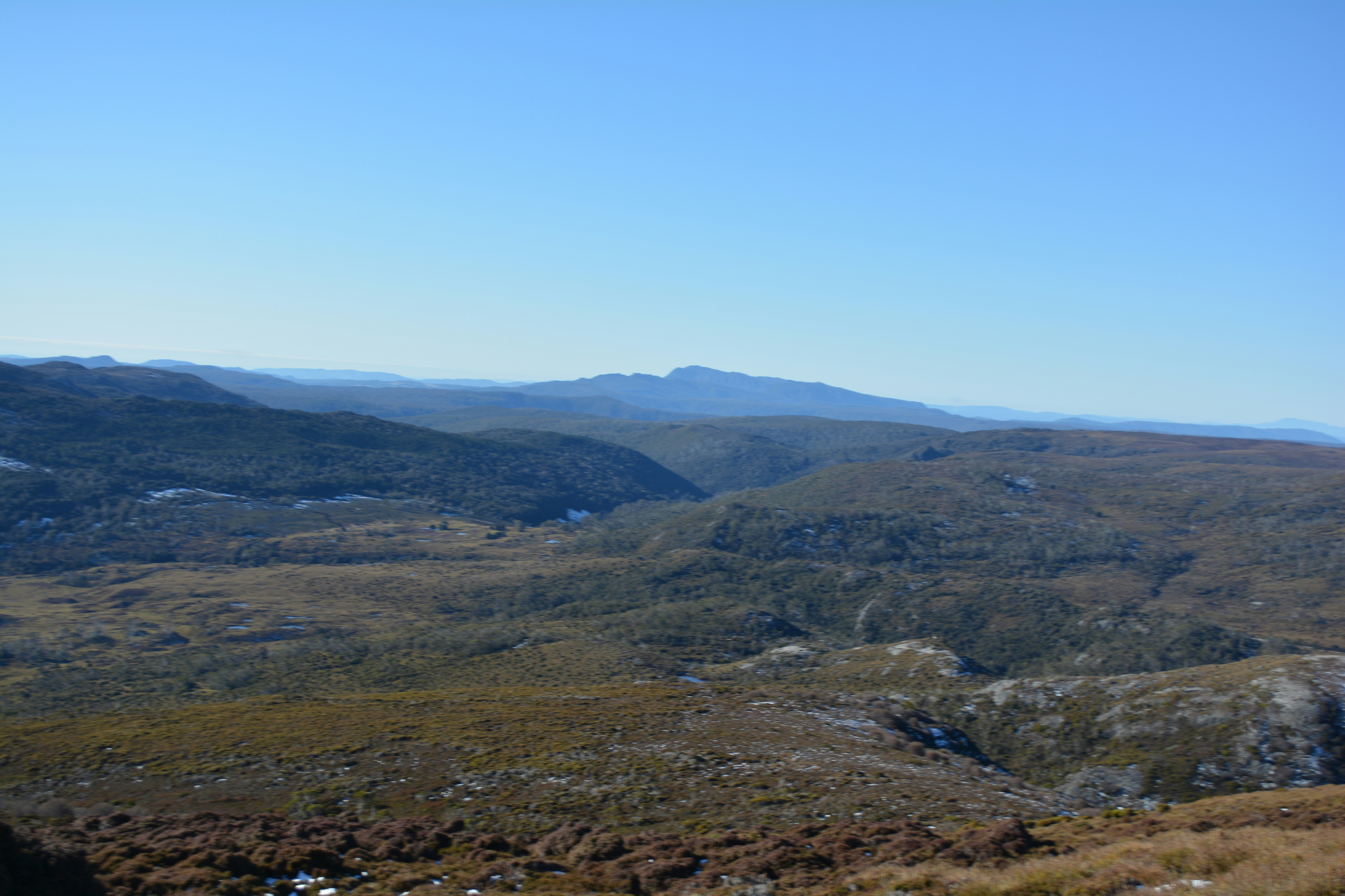 A view of a mountain range from a distance