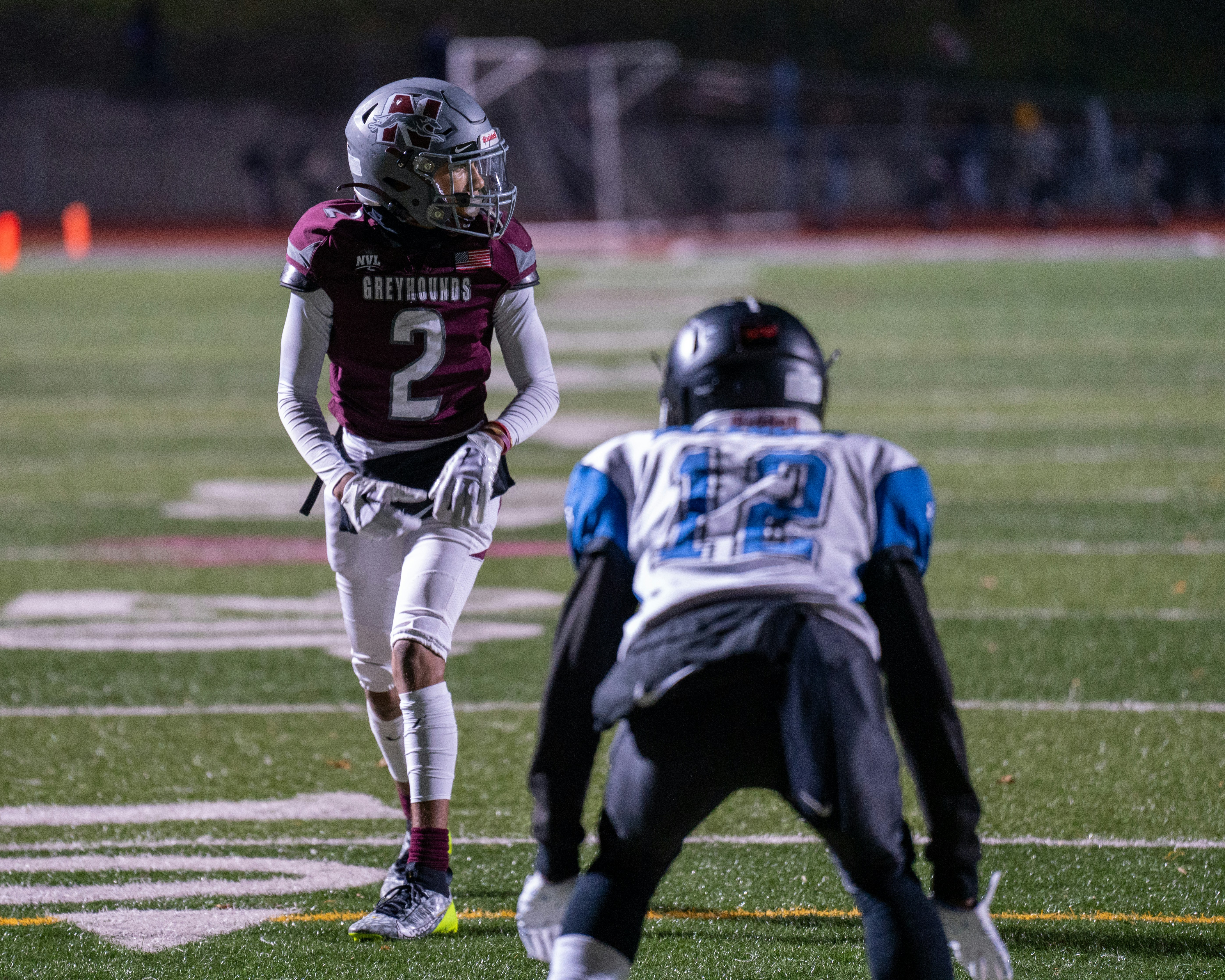 A football player is running with the ball