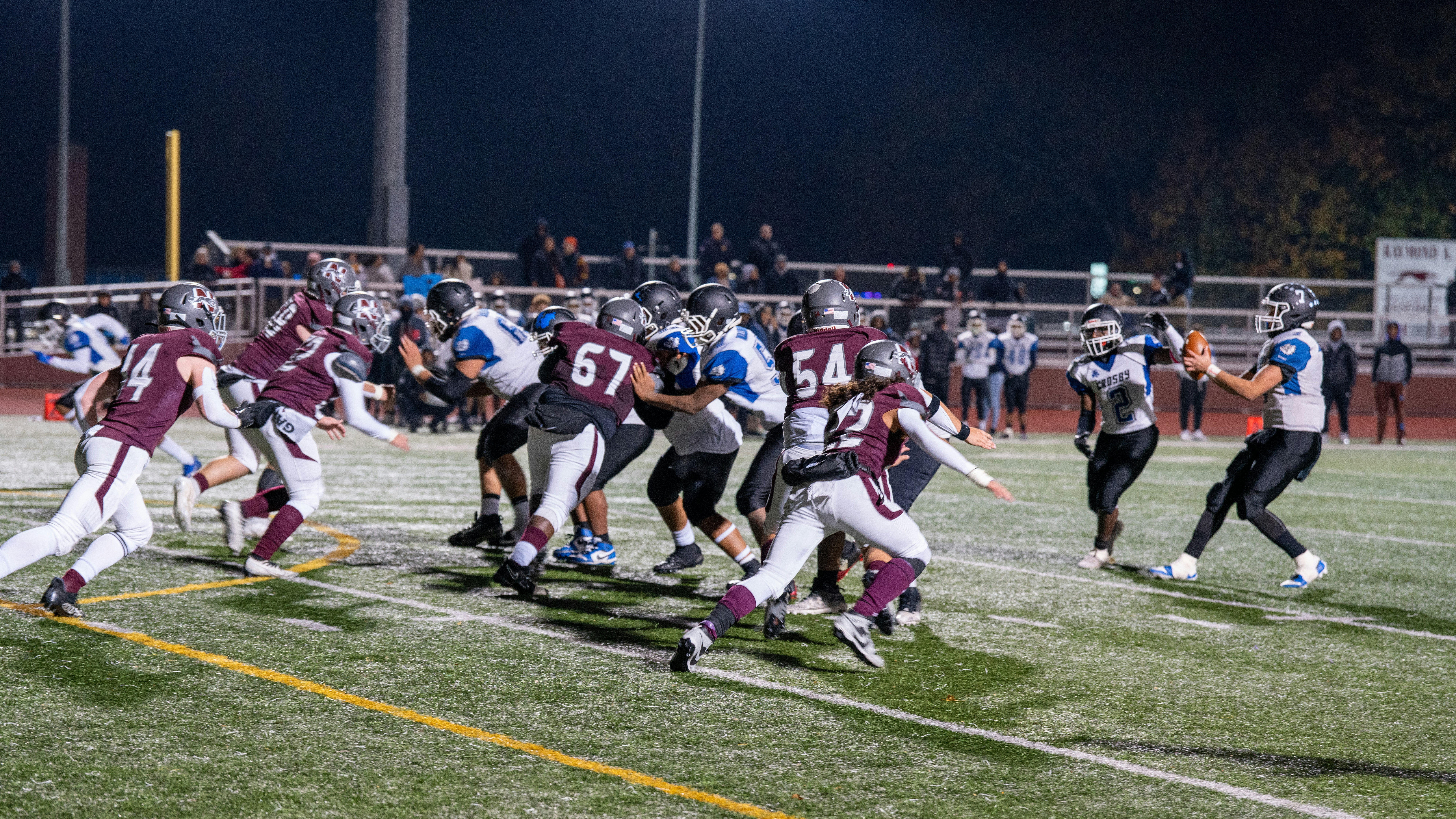 A football game is being played on the field
