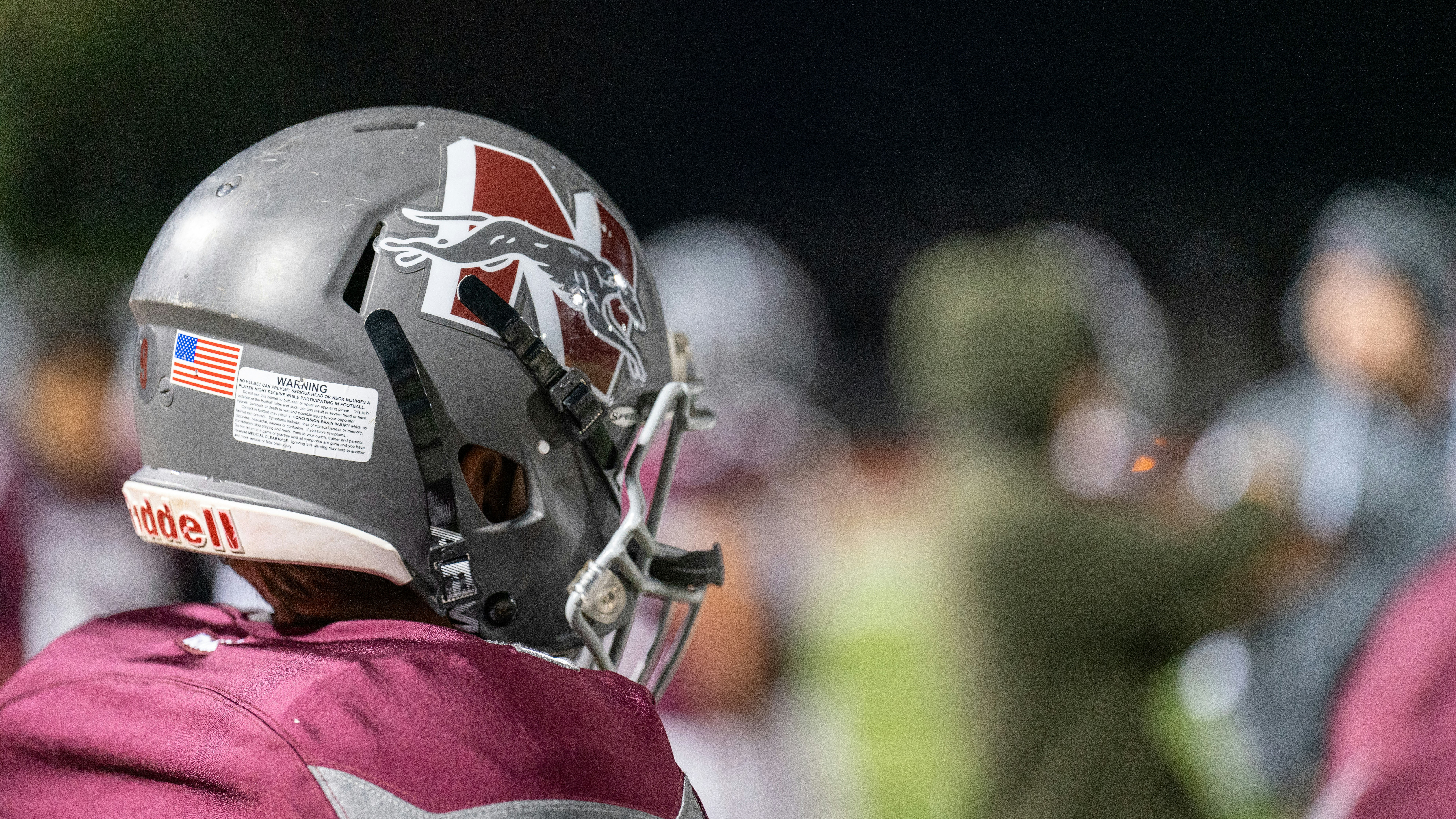 A close up of a football player wearing a helmet