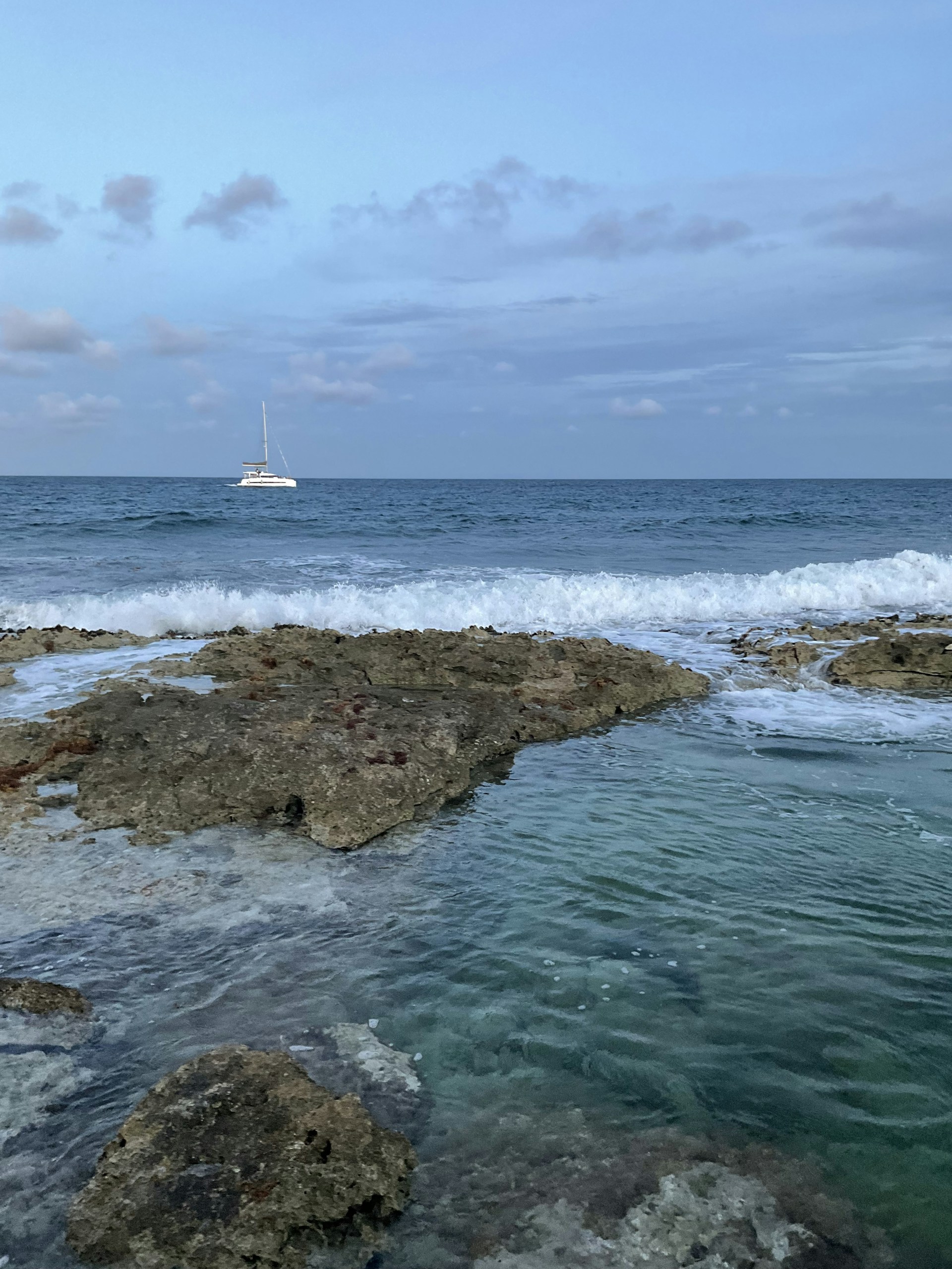 A body of water with a boat in the distance