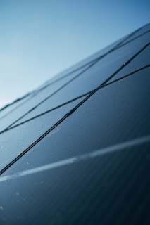 A close up of a solar panel on a building