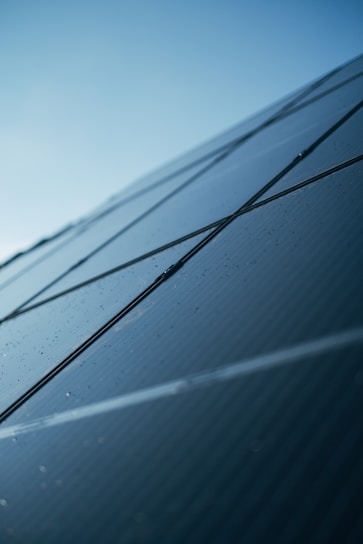 A close up of a solar panel on a building