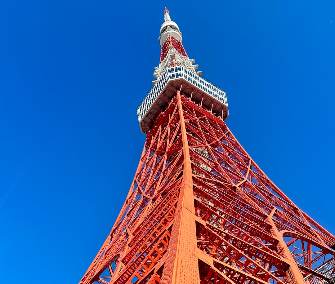 The top of the eiffel tower against a blue sky, Tokyo Tower, Tokyo, Japan.