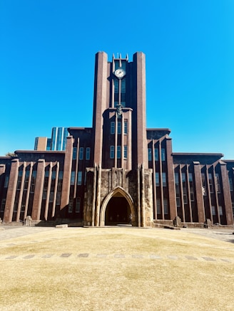 A large building with a clock on the front of it