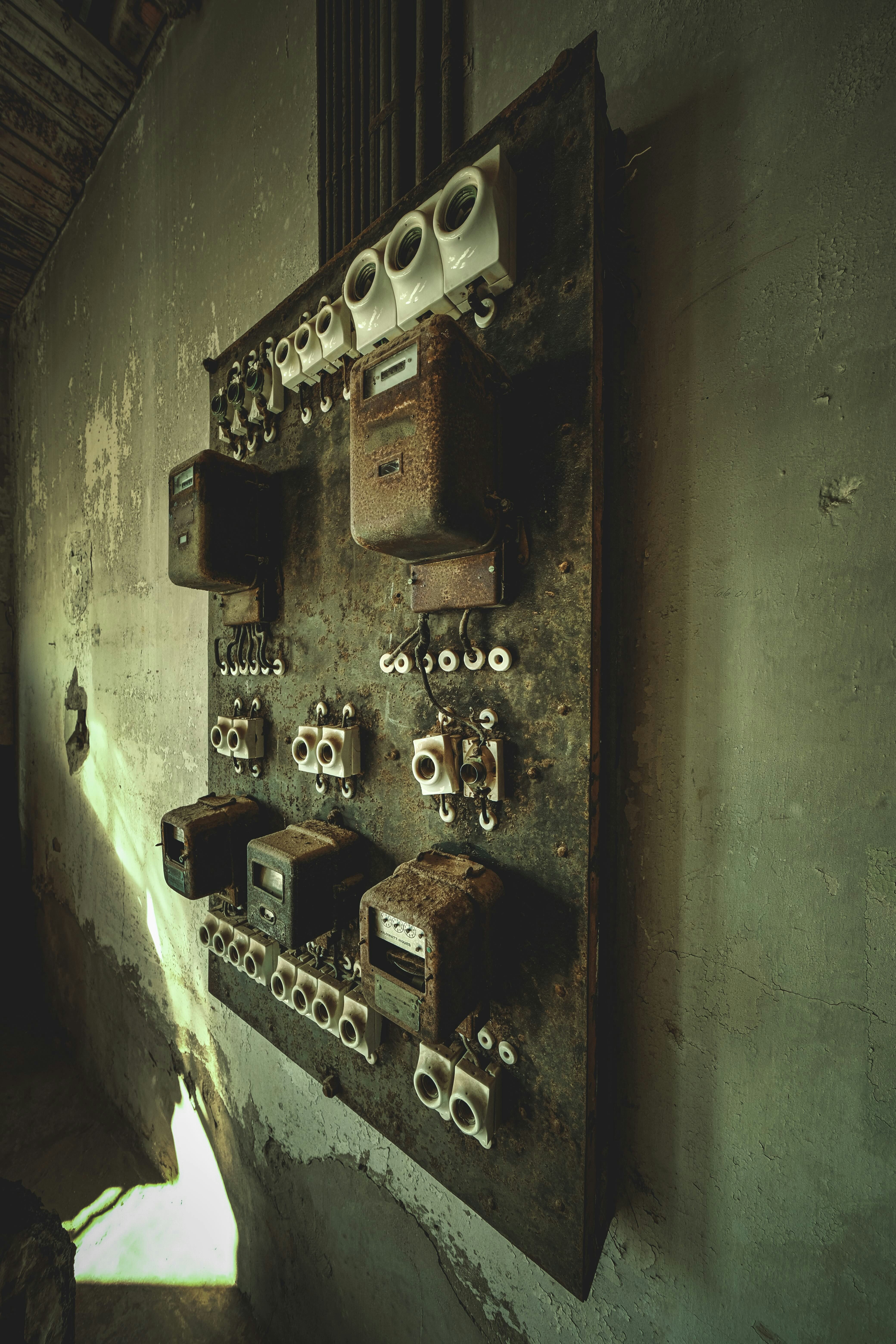 A room with a bunch of electrical equipment on the wall