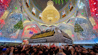 A large group of people standing in front of a building