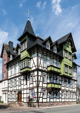 A large building with many windows on the side of it