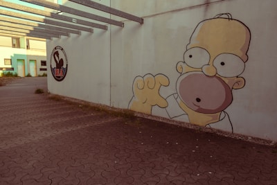 A wall with a cartoon character painted on it