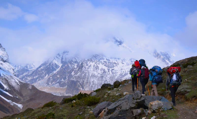 A group of people hiking up a mountain
