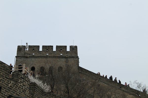A very tall building with a clock on it's side — Beijing & the Great Wall, China