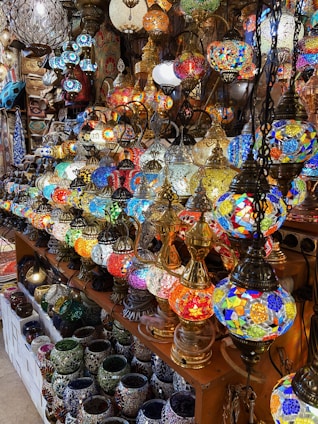 A store filled with lots of different colored vases