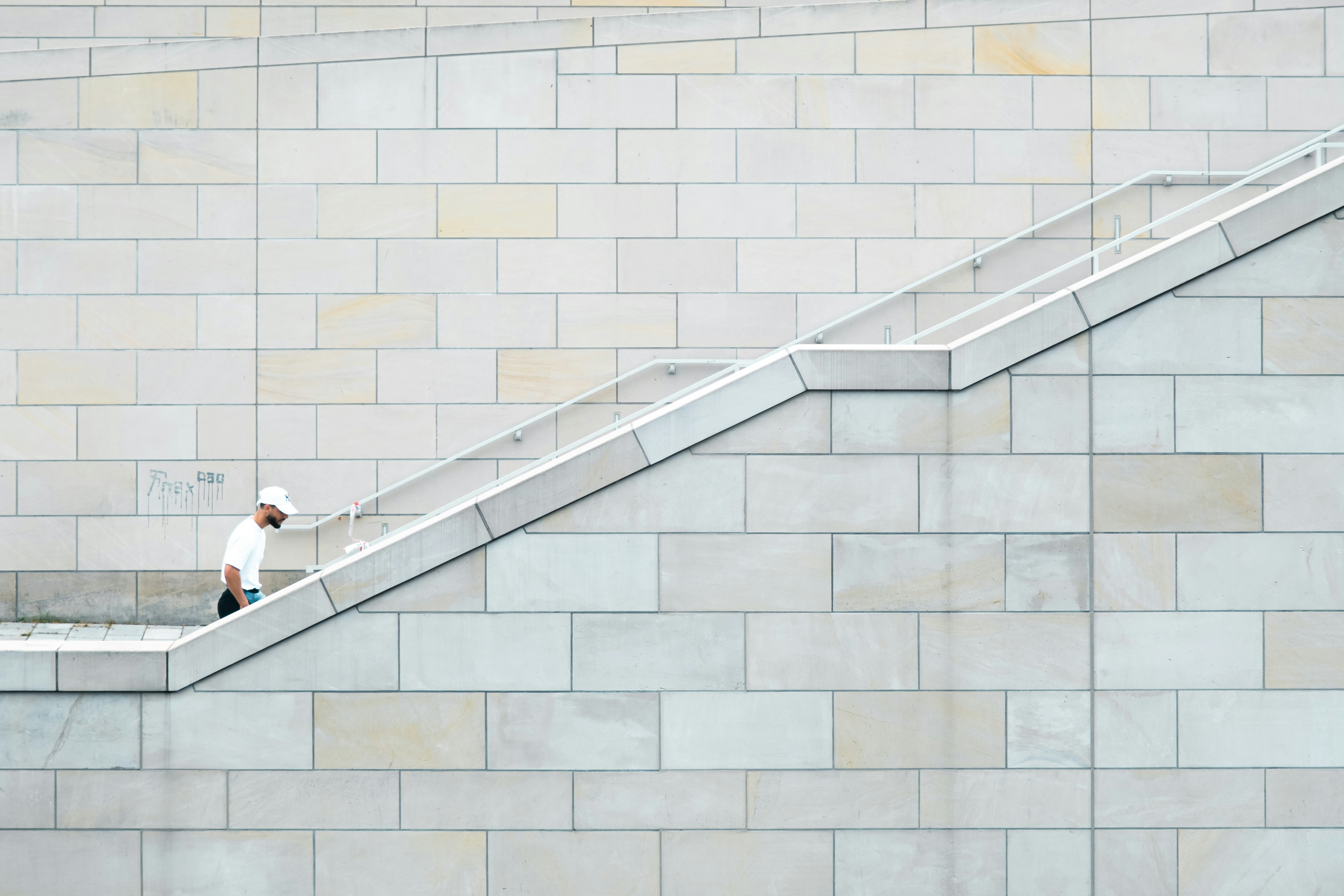 Personal Branding for Developers - A person walking up a set of stairs