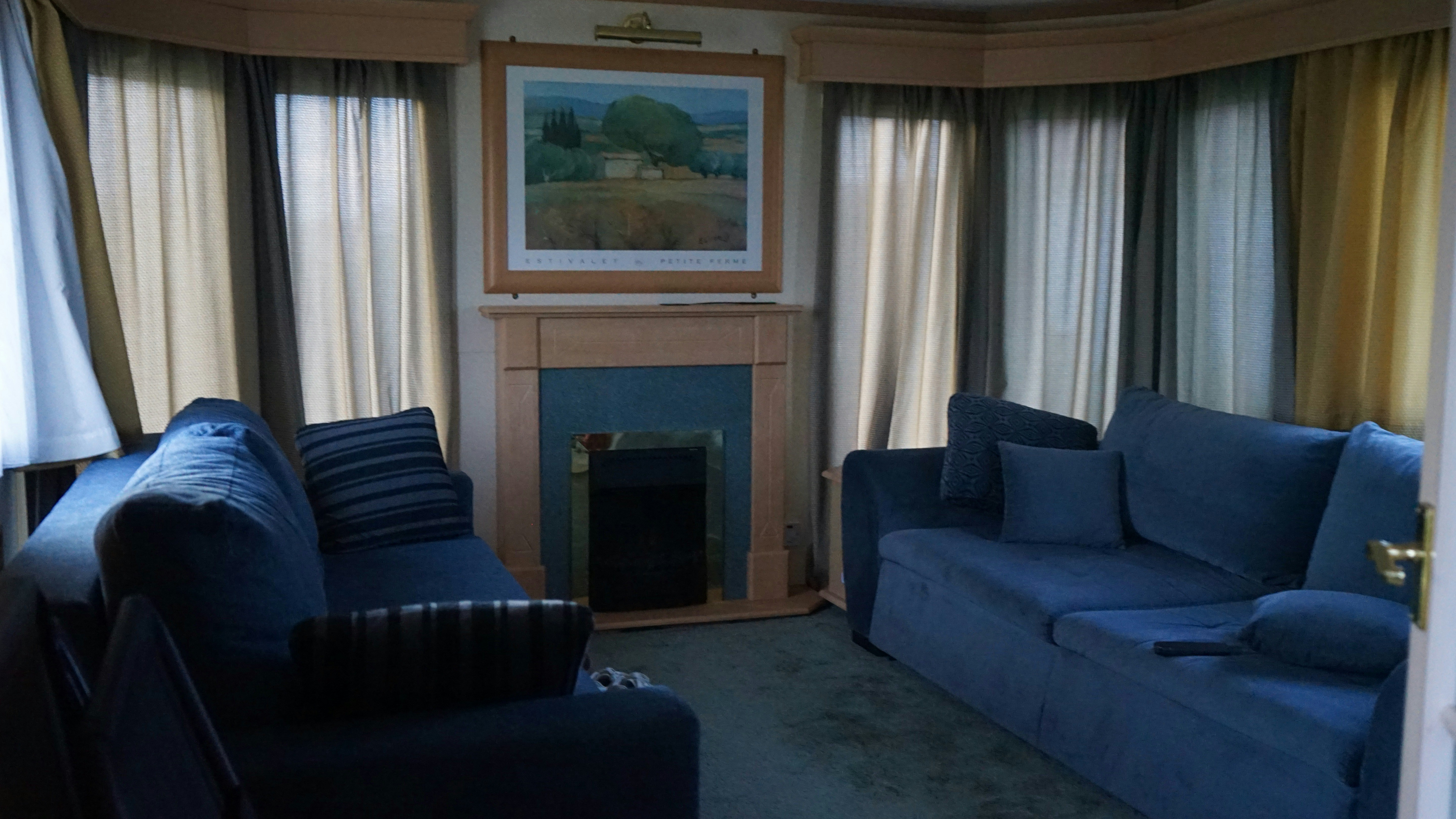 Beautifully restored living room showing complete recovery from water damage - water damage drying company