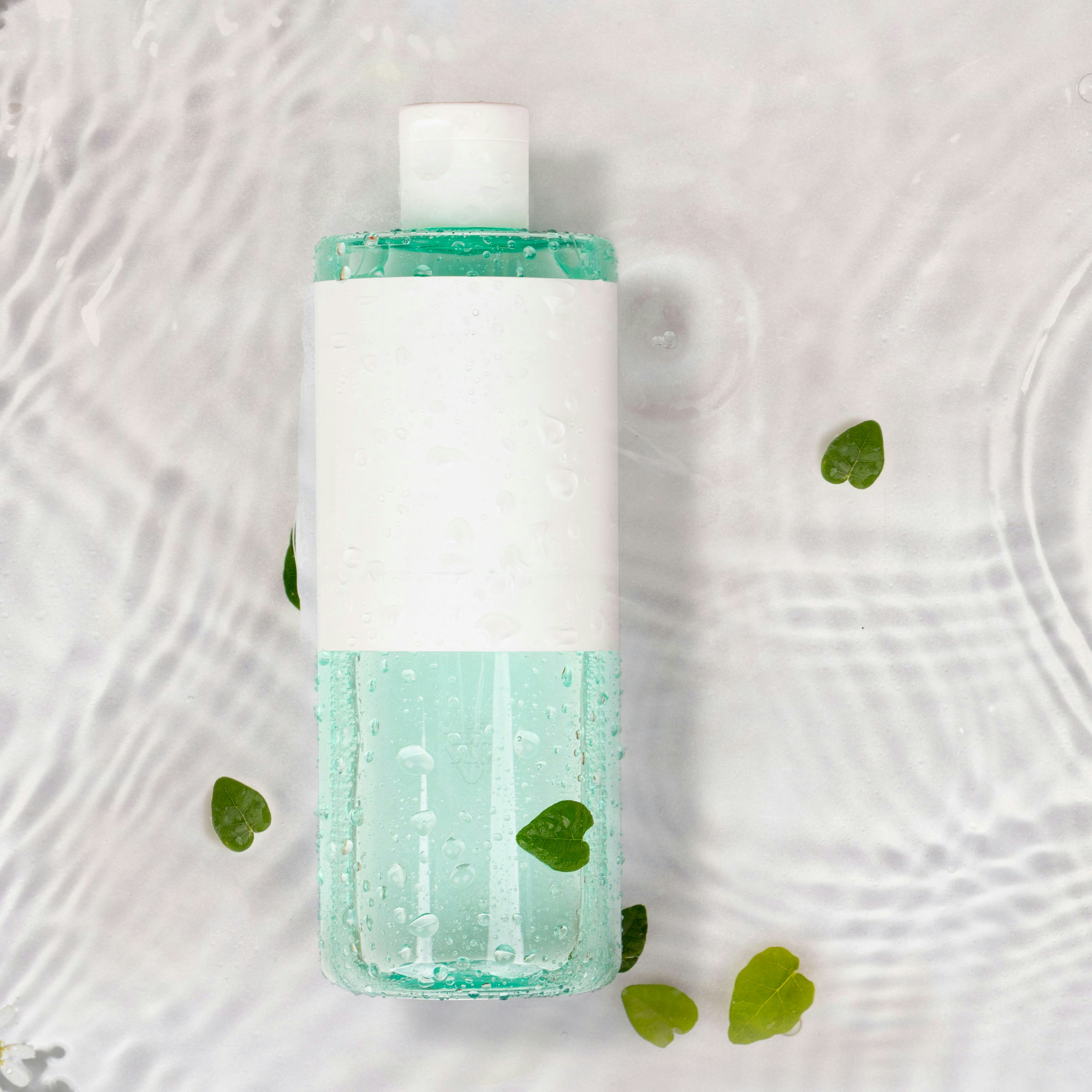 A bottle of soap sitting on top of a table