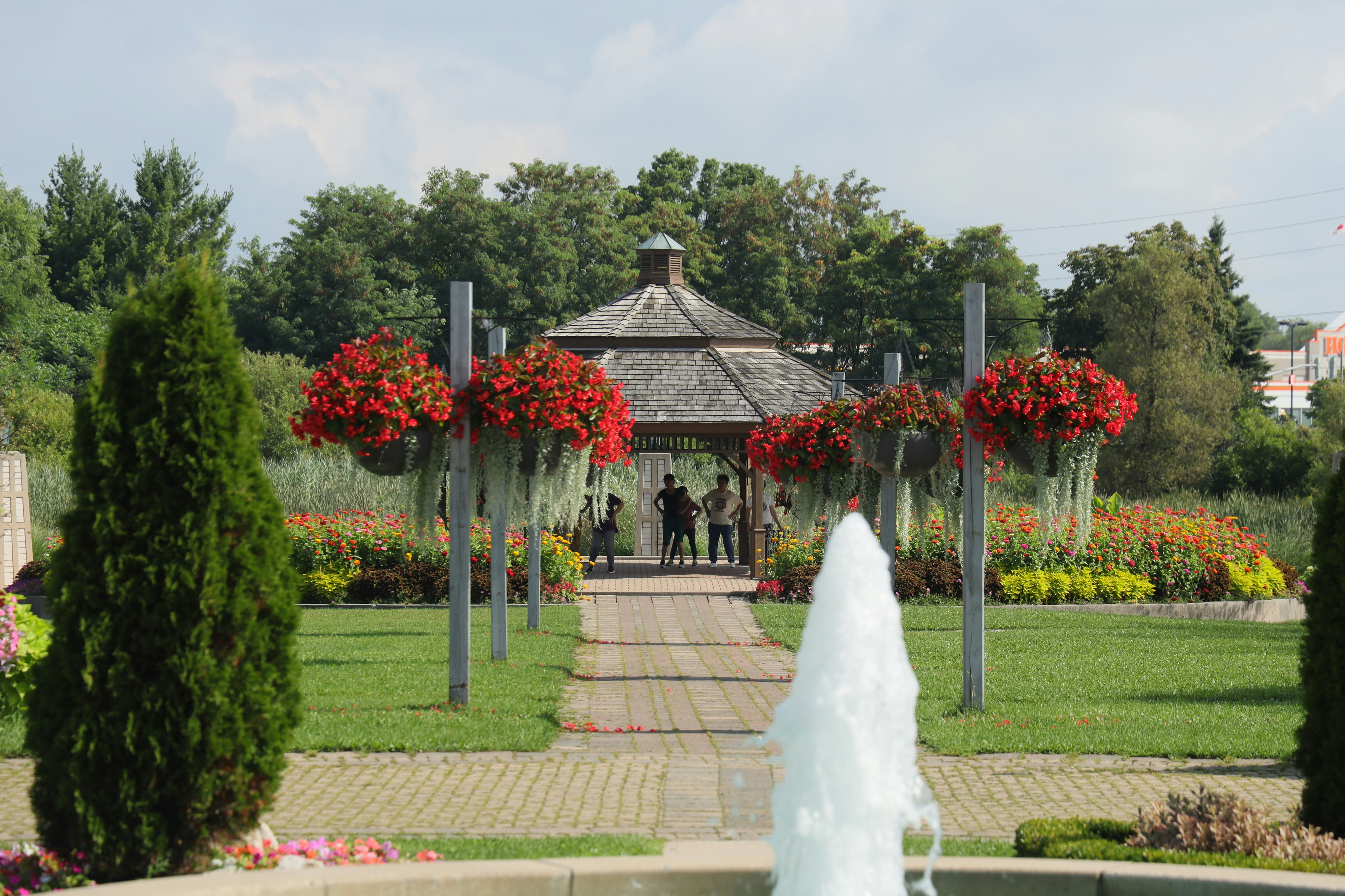 A park with a fountain and a gazebo