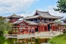 A large building sitting next to a body of water
