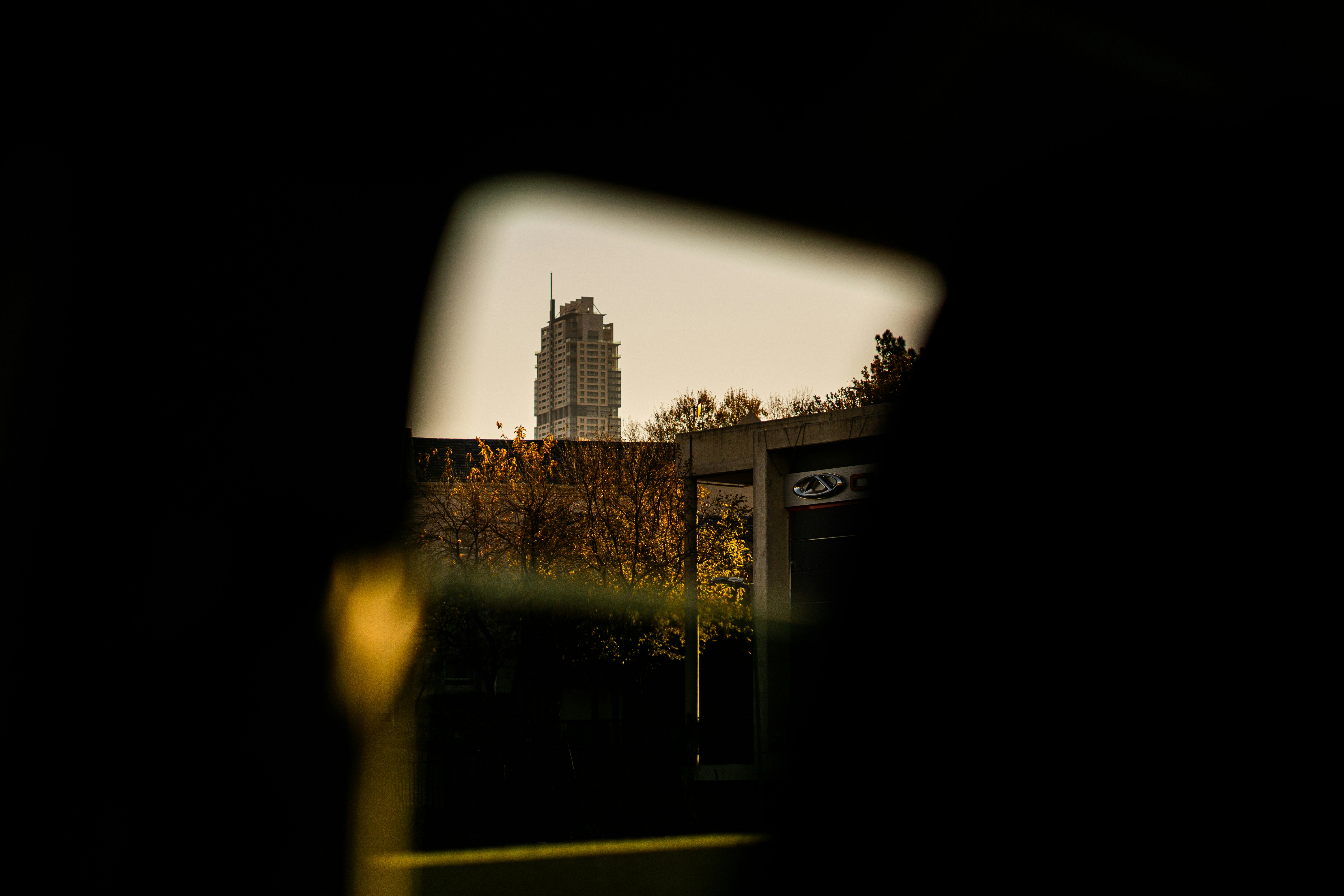 A view of a city from a bus window