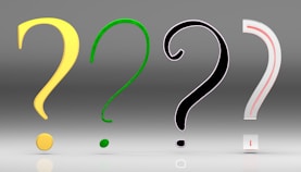 A group of question marks sitting next to each other