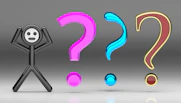 A person standing in front of a group of question marks