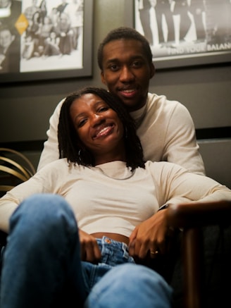 A man and a woman sitting on a couch
