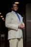 A man in a suit and tie standing in a room