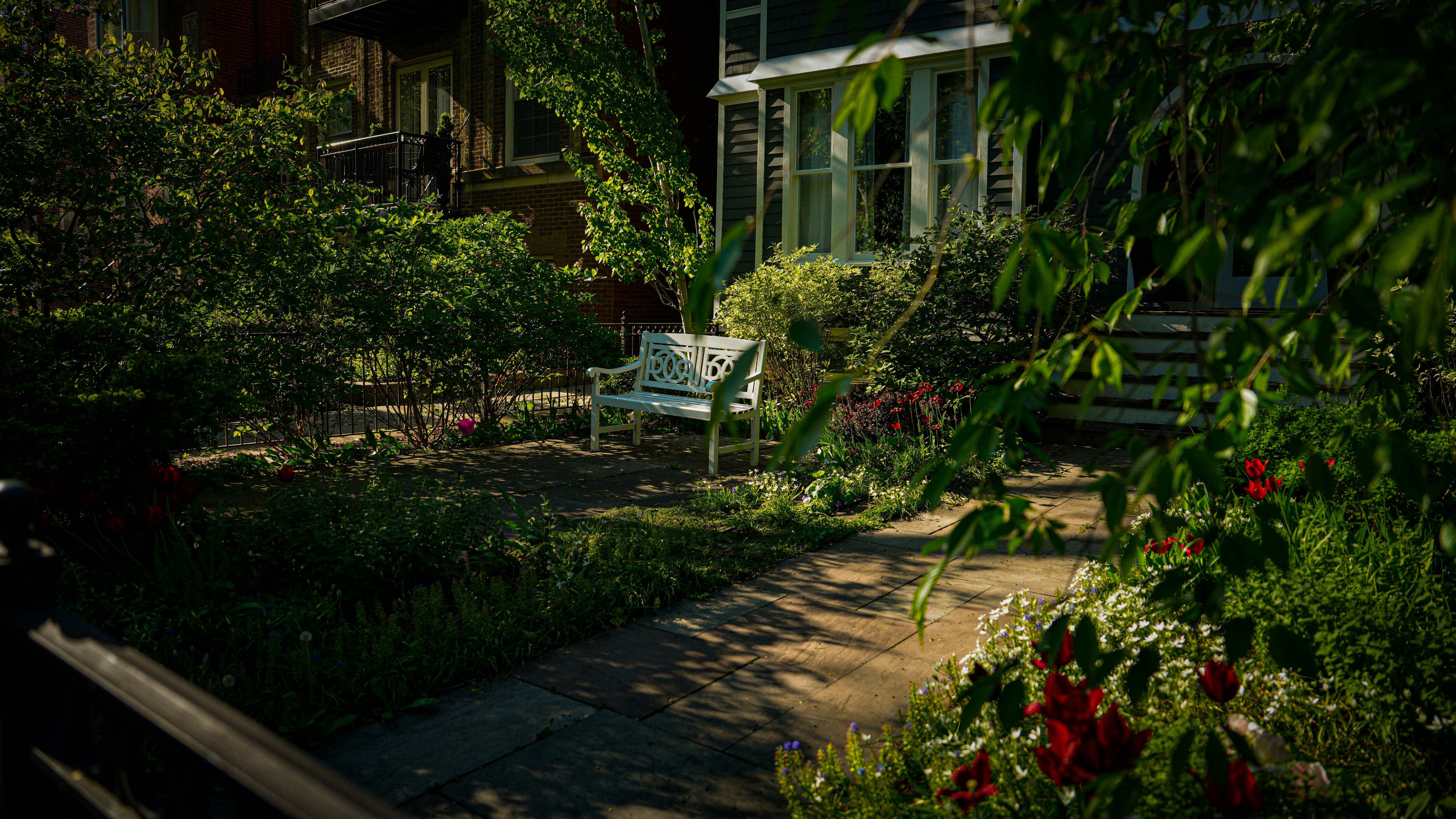 A house with a garden in front of it
