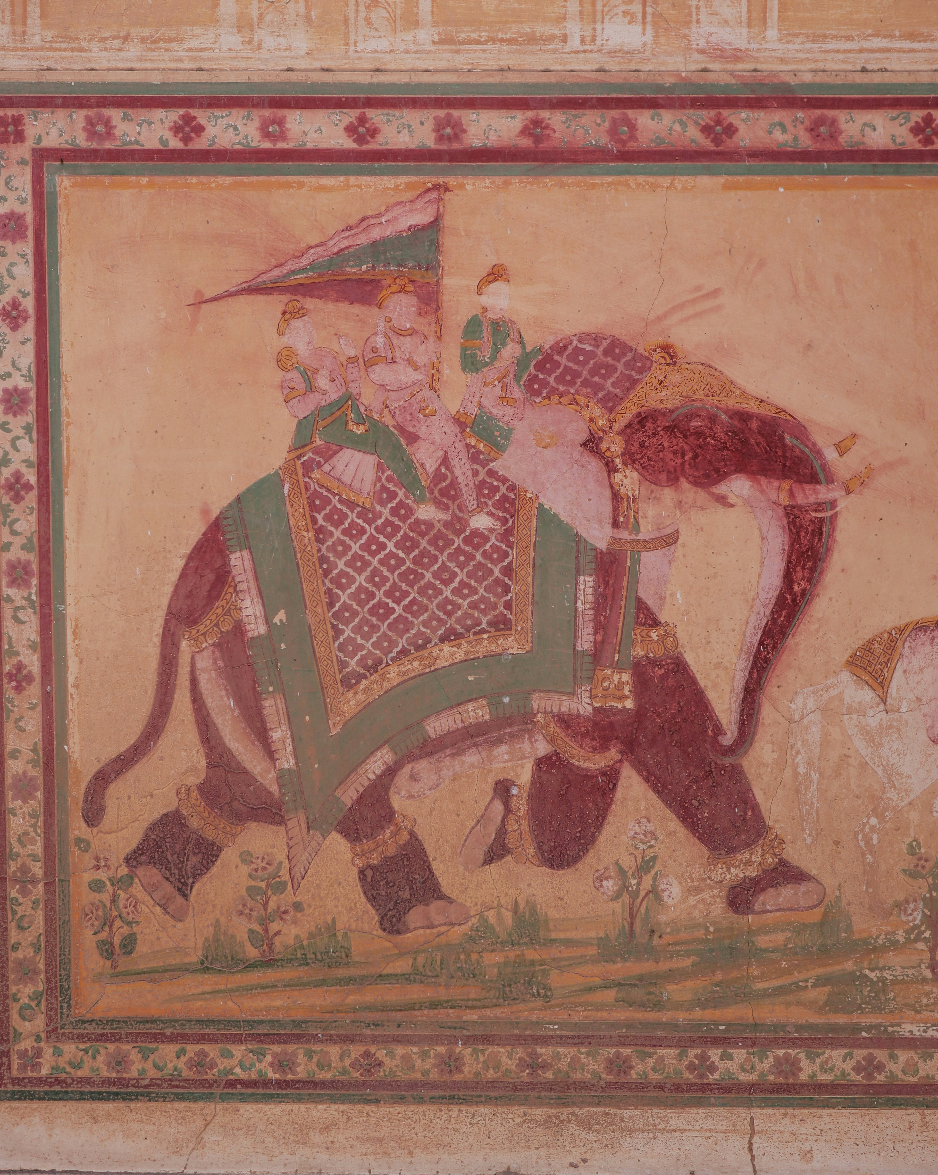 A painting of a man riding an elephant