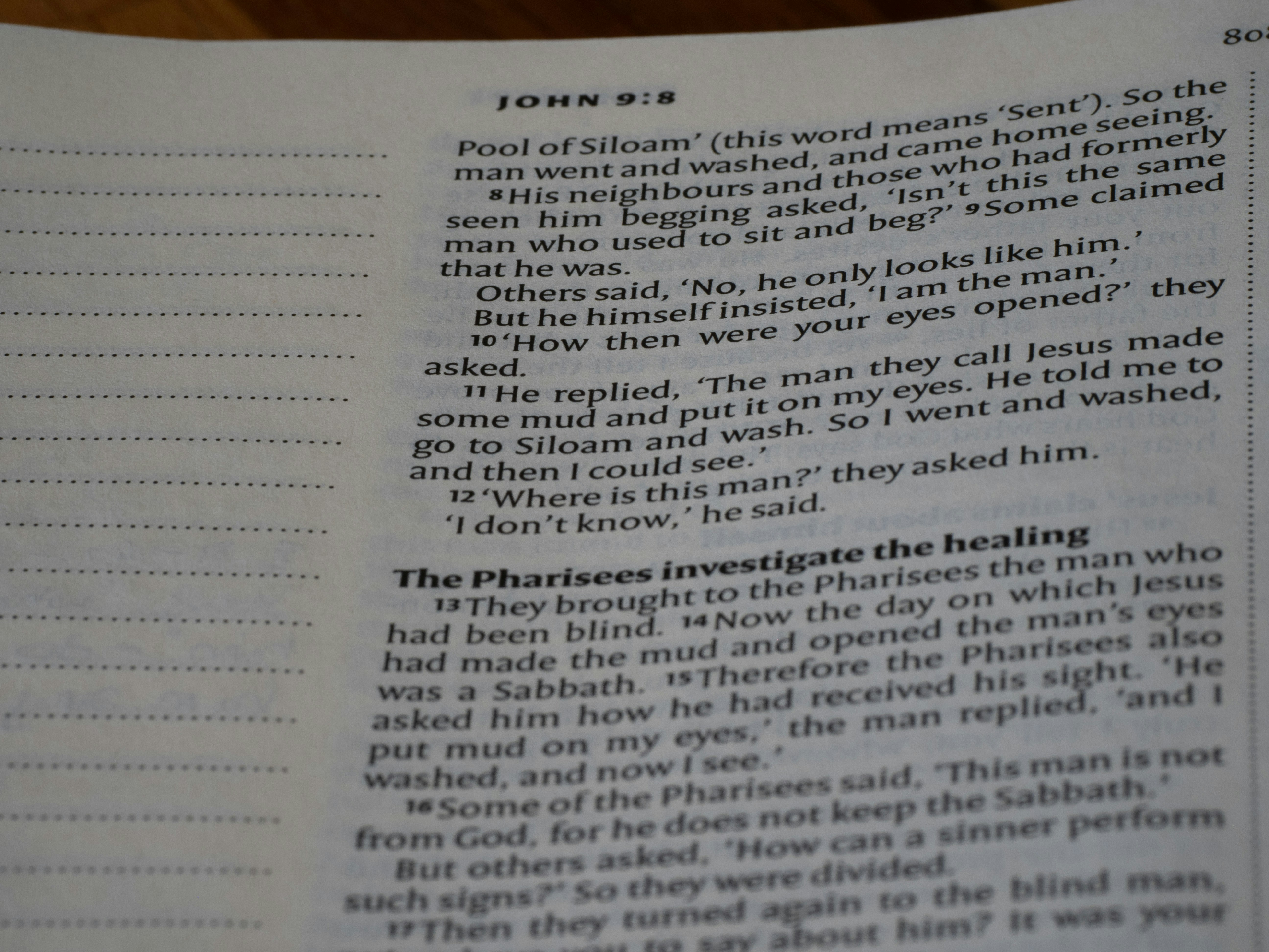 A close up of an open book on a table