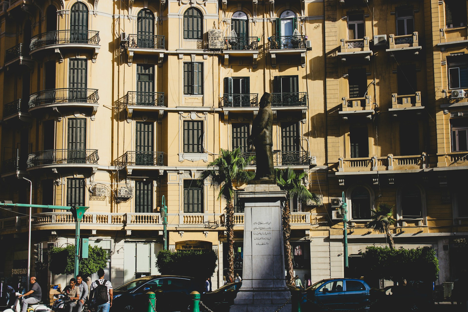 A tall building with balconies and balconies on the top of it
