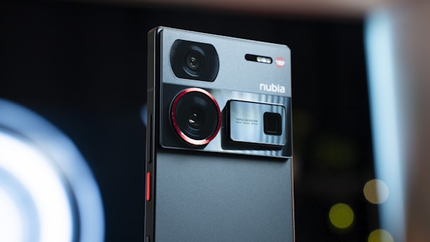 A close up of a cell phone on a table
