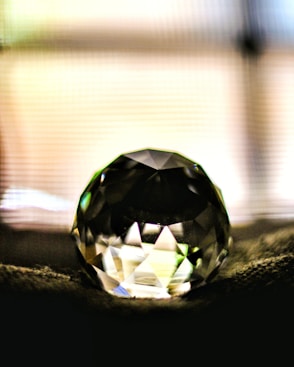 A black diamond sitting on top of a table