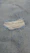 A piece of cloth that has been torn off