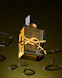 A bottle of perfume floating in the air next to a pair of scissors