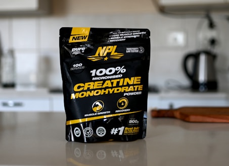 A bag of creatine monohydrate sitting on a counter